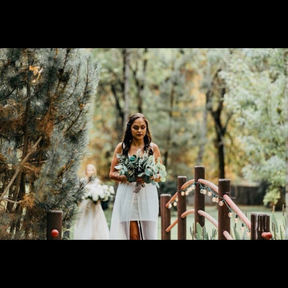 Long white dress with sheer bottom slit